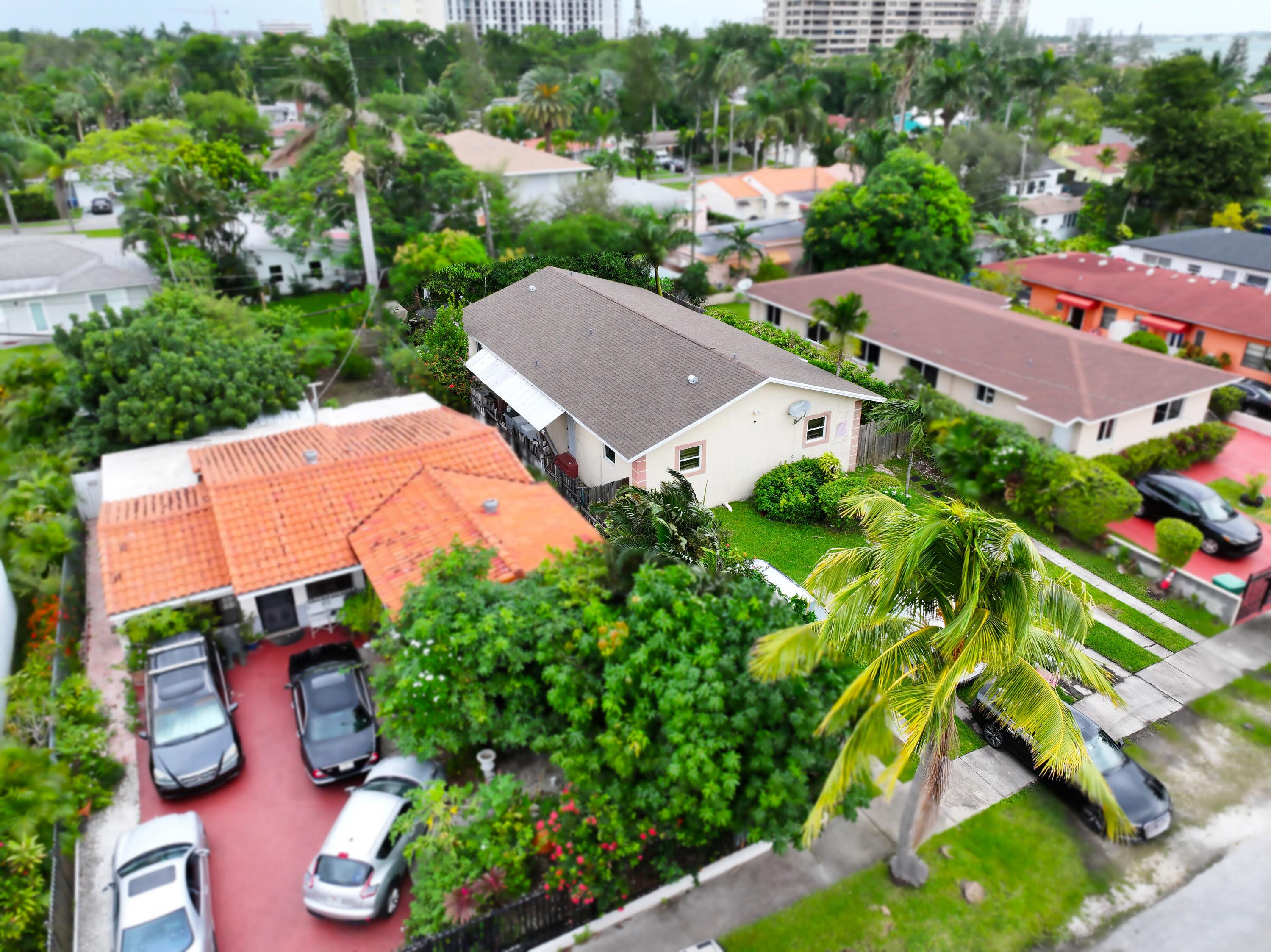 an aerial view of a house with a garden