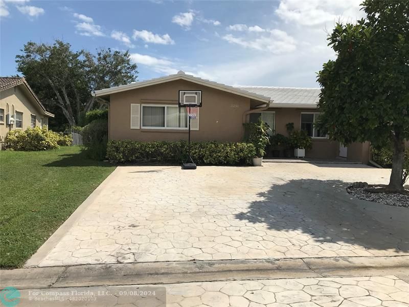 a front view of house with yard