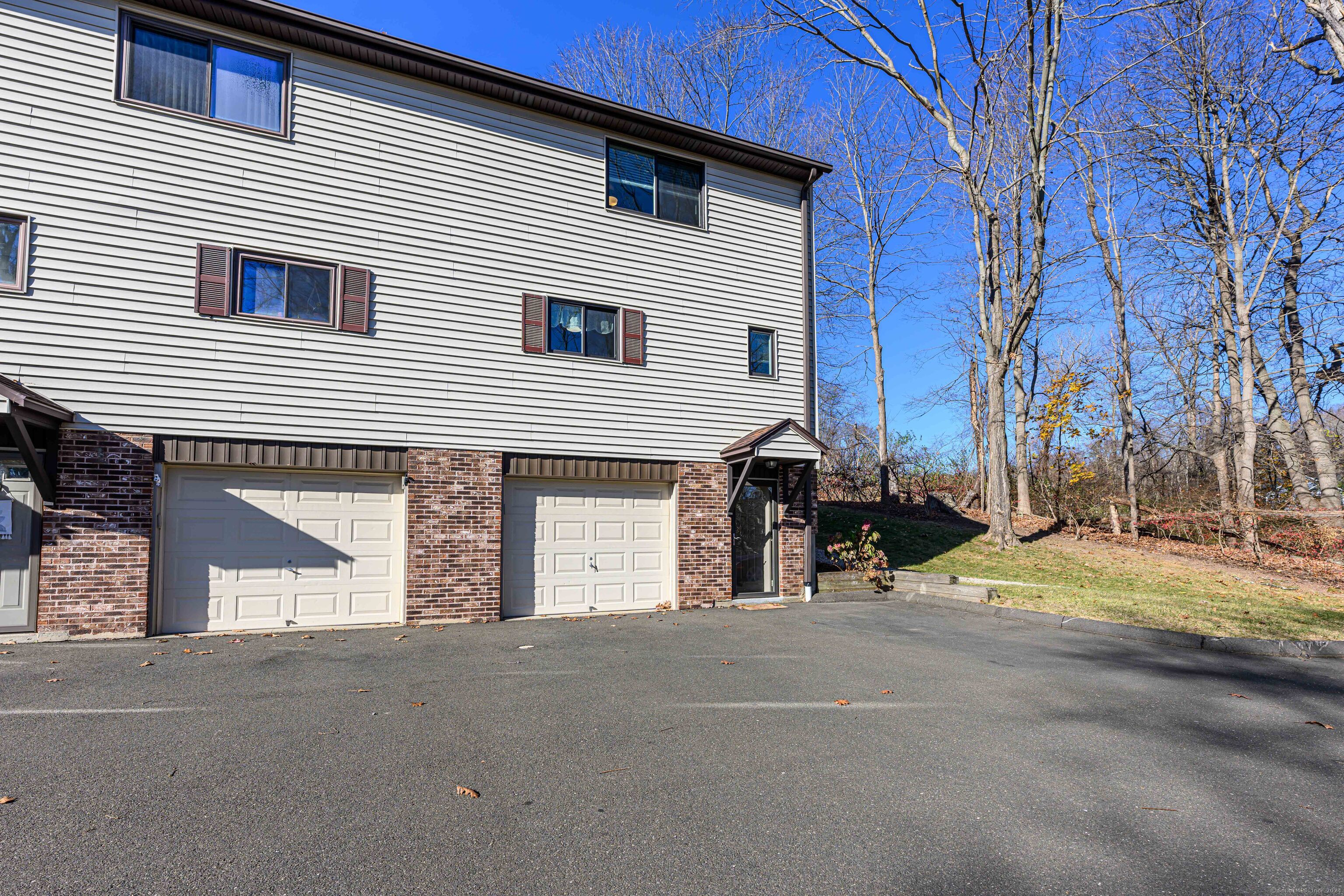 Three level unit with garage under and basement.