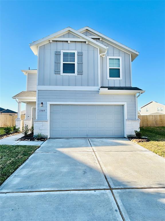 a front view of a house with yard