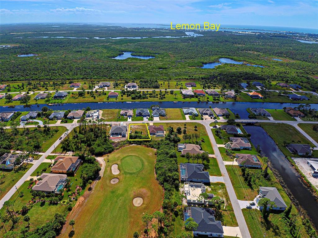 an aerial view of a house with a garden