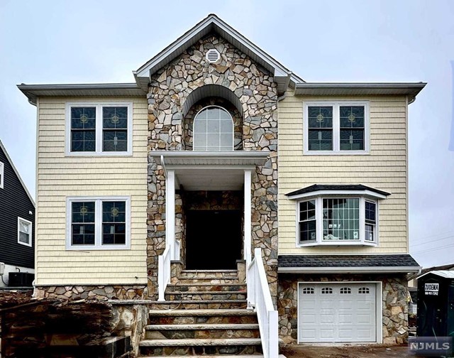 a front view of a house with a door