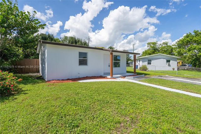 $330,000 | 1833 Northwest 25th Terrace | Lake Aire Palm View