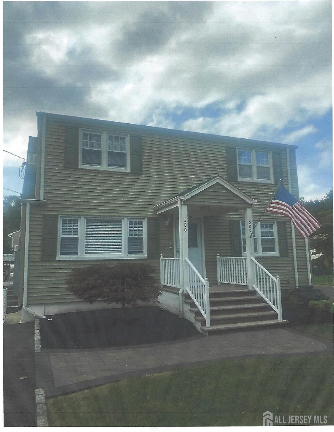 a view of house with yard