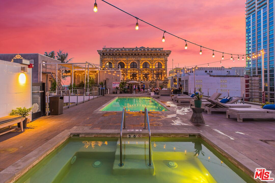 a view of a swimming pool with a patio