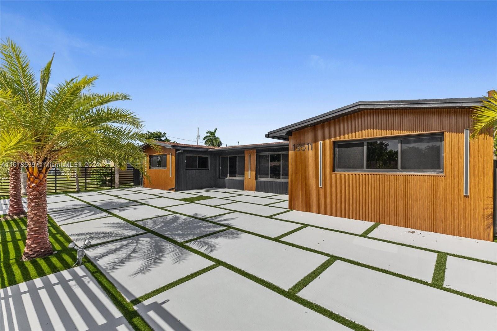 a front view of a house with yard