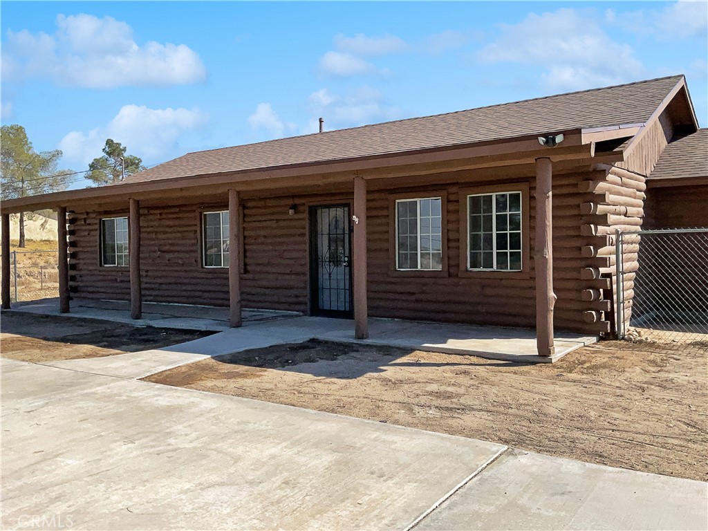 a view of house with garage