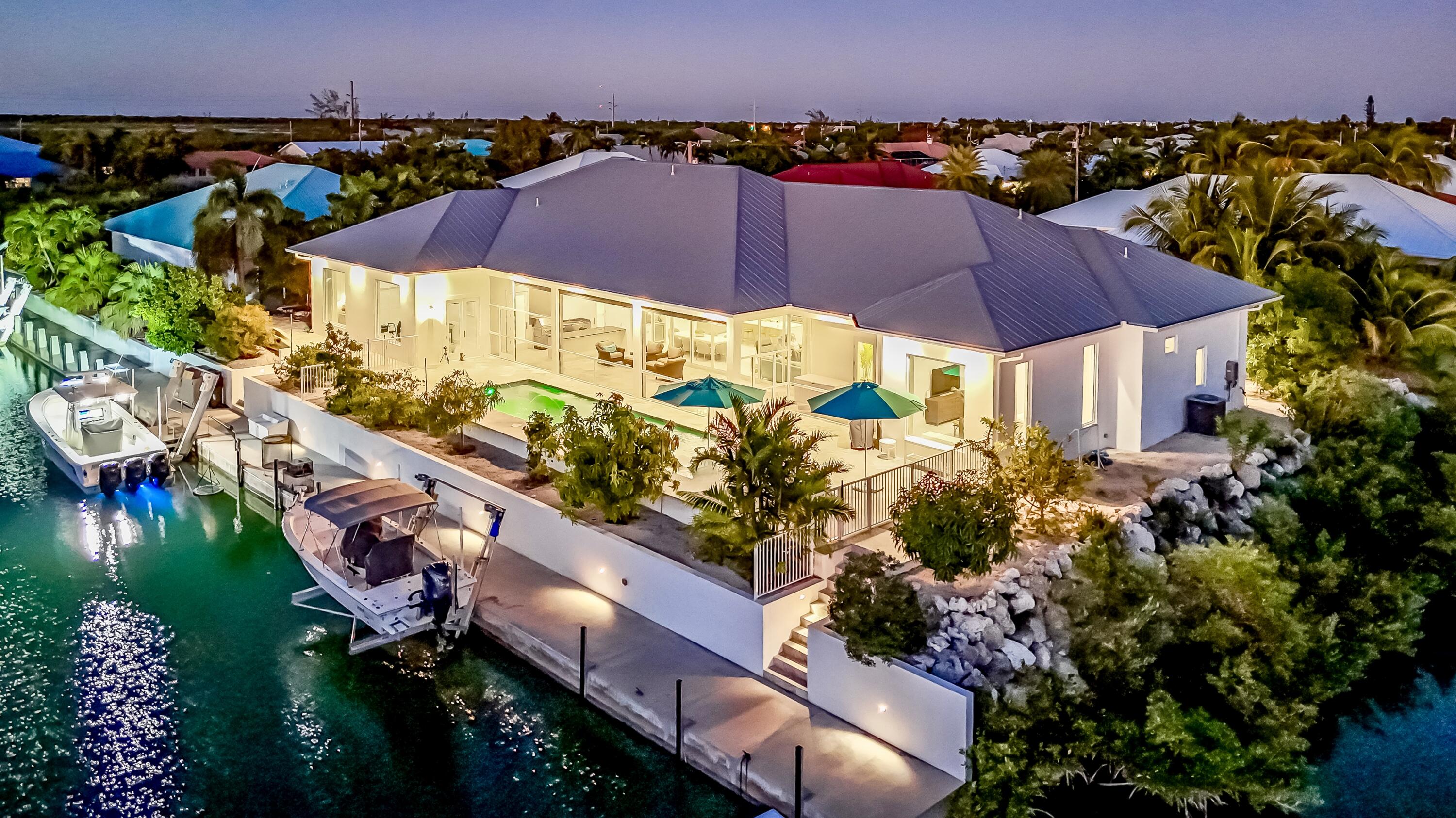 an aerial view of residential houses and outdoor space