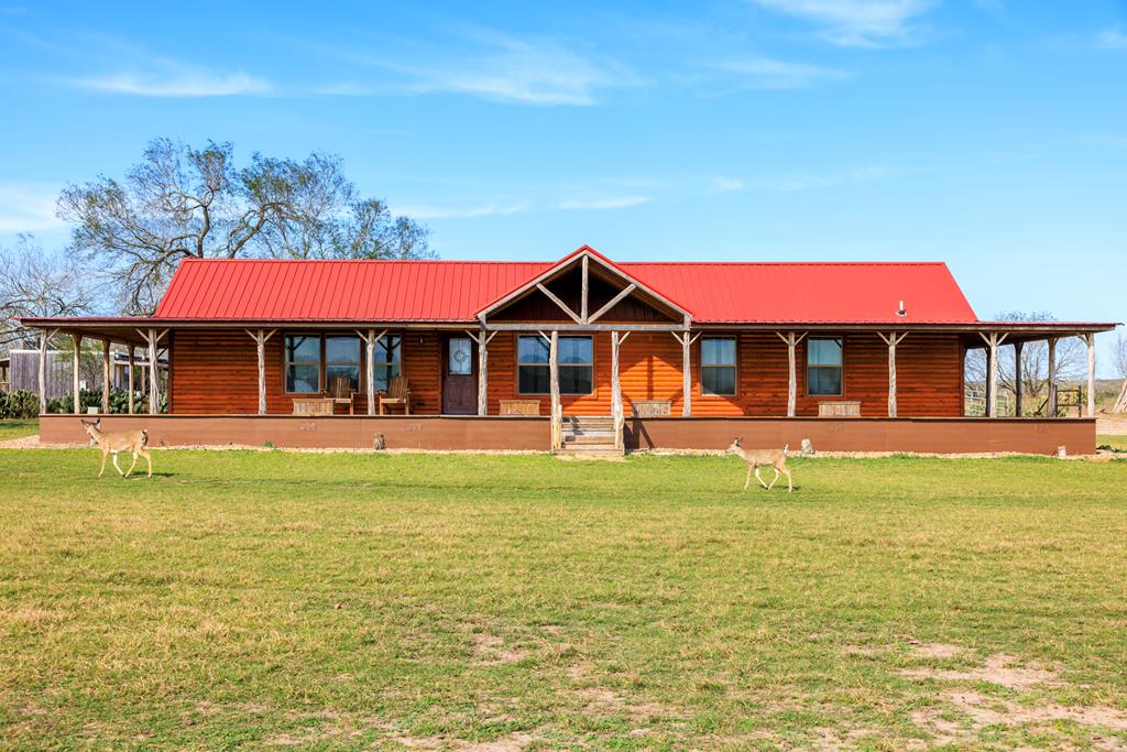 a front view of a house with swimming pool