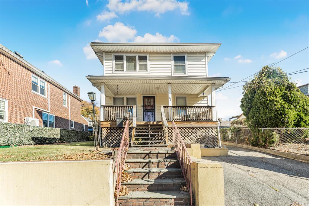 View of front of house featuring a porch