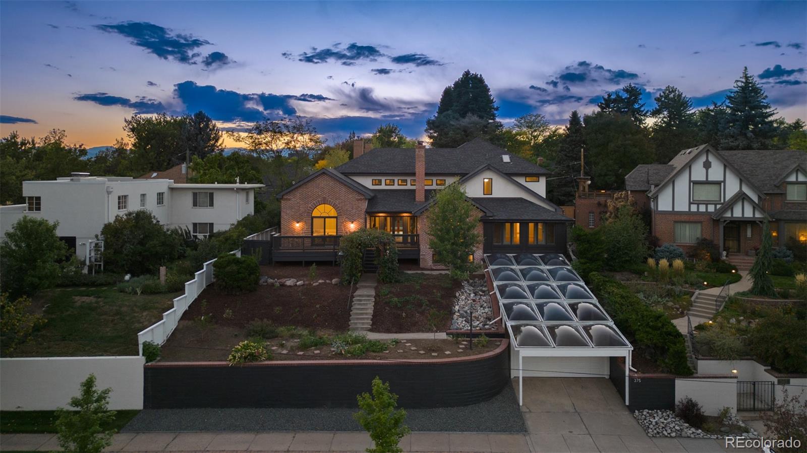 aerial view of a house with a yard