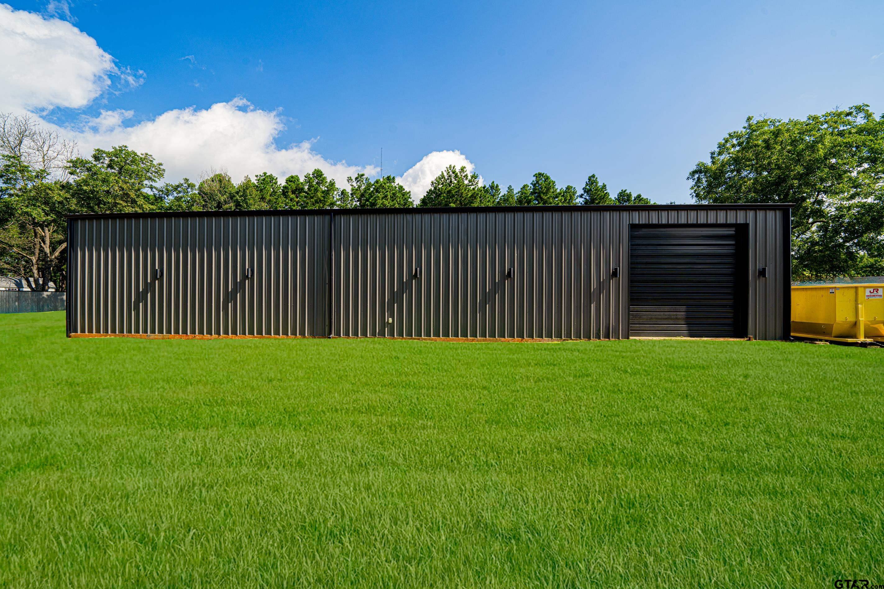 a view of a backyard with a garden