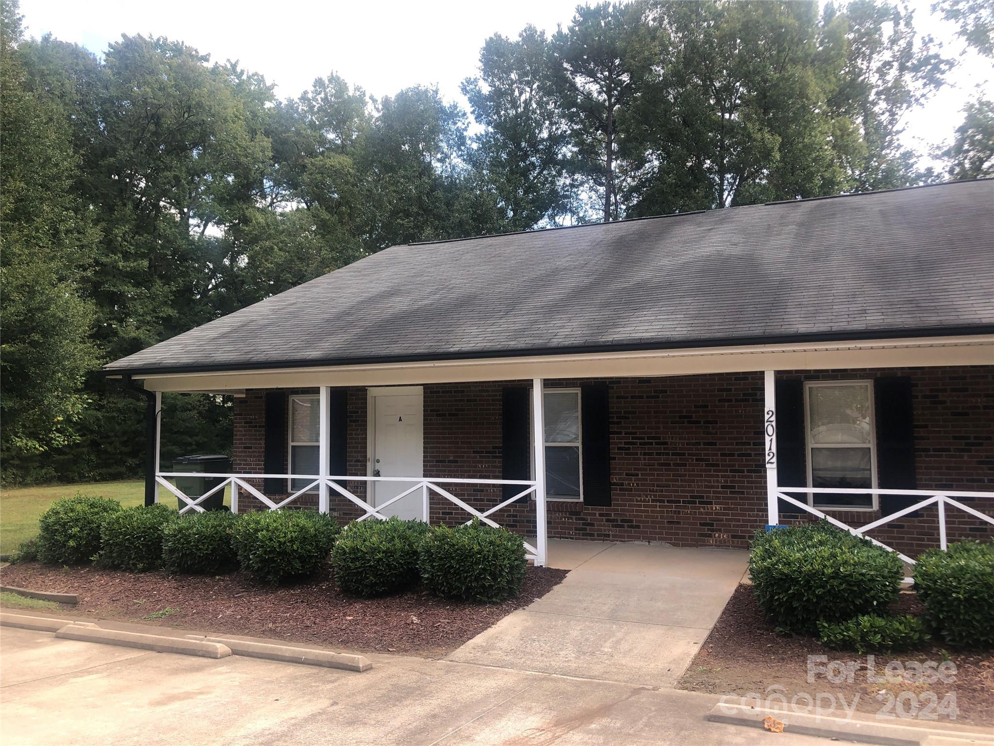 a side view of a house with garage