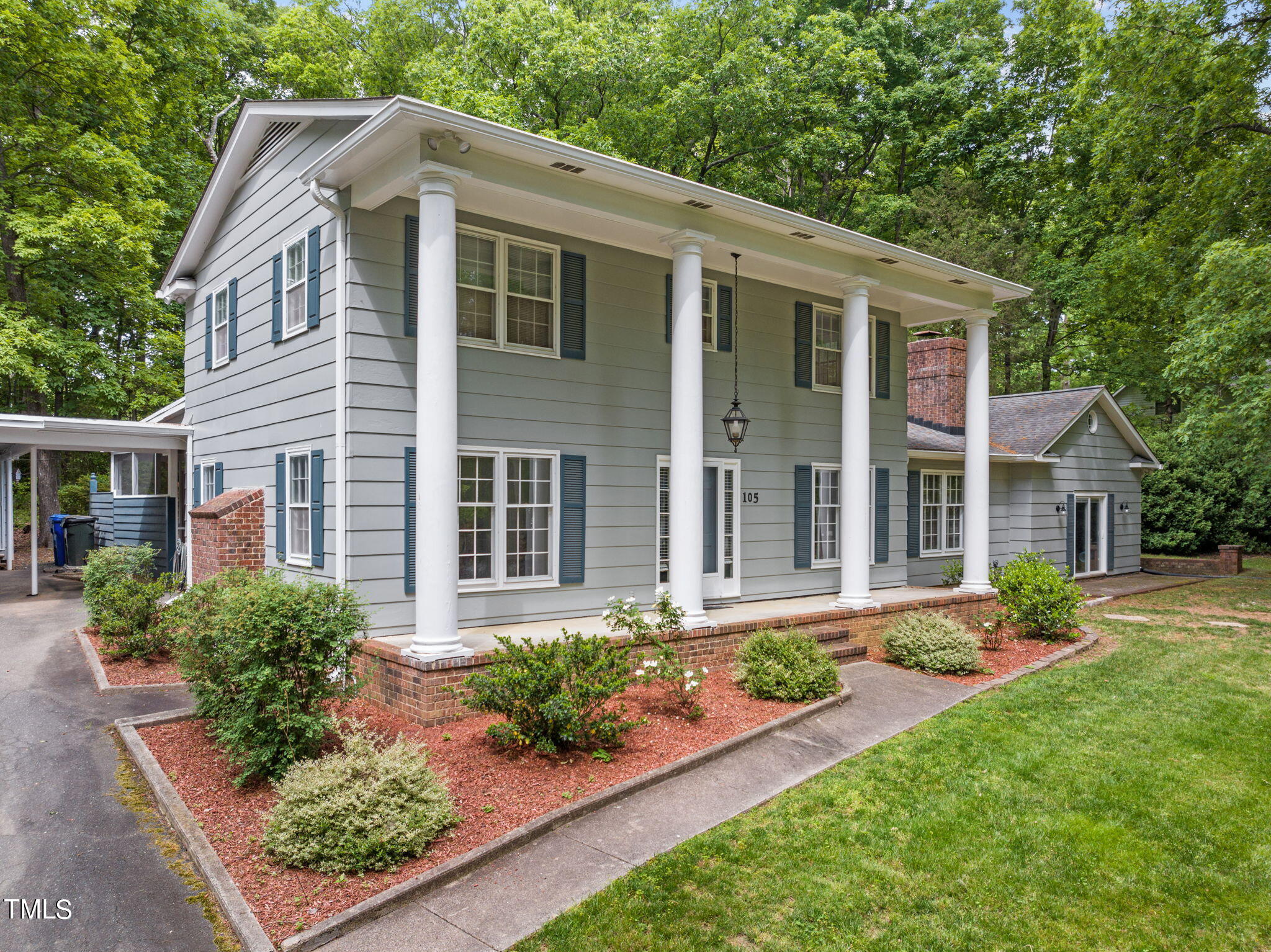 front view of a house with a yard