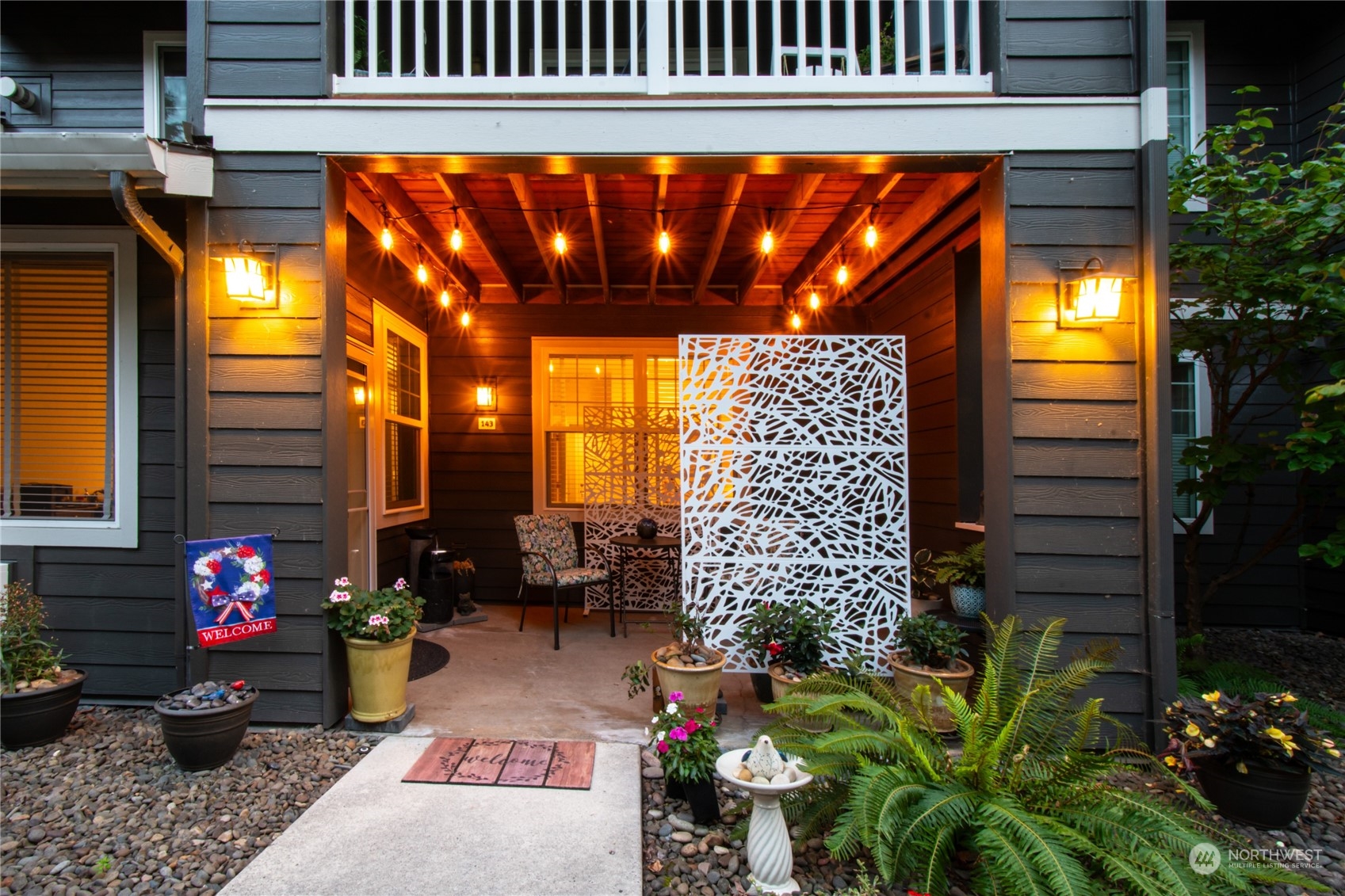 a view of entryway with flower pots