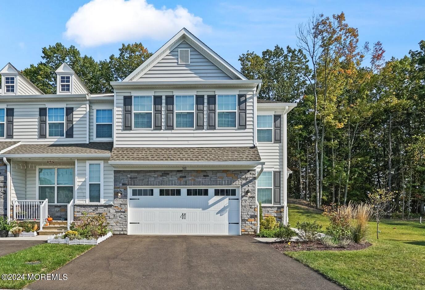 front view of a house with a yard