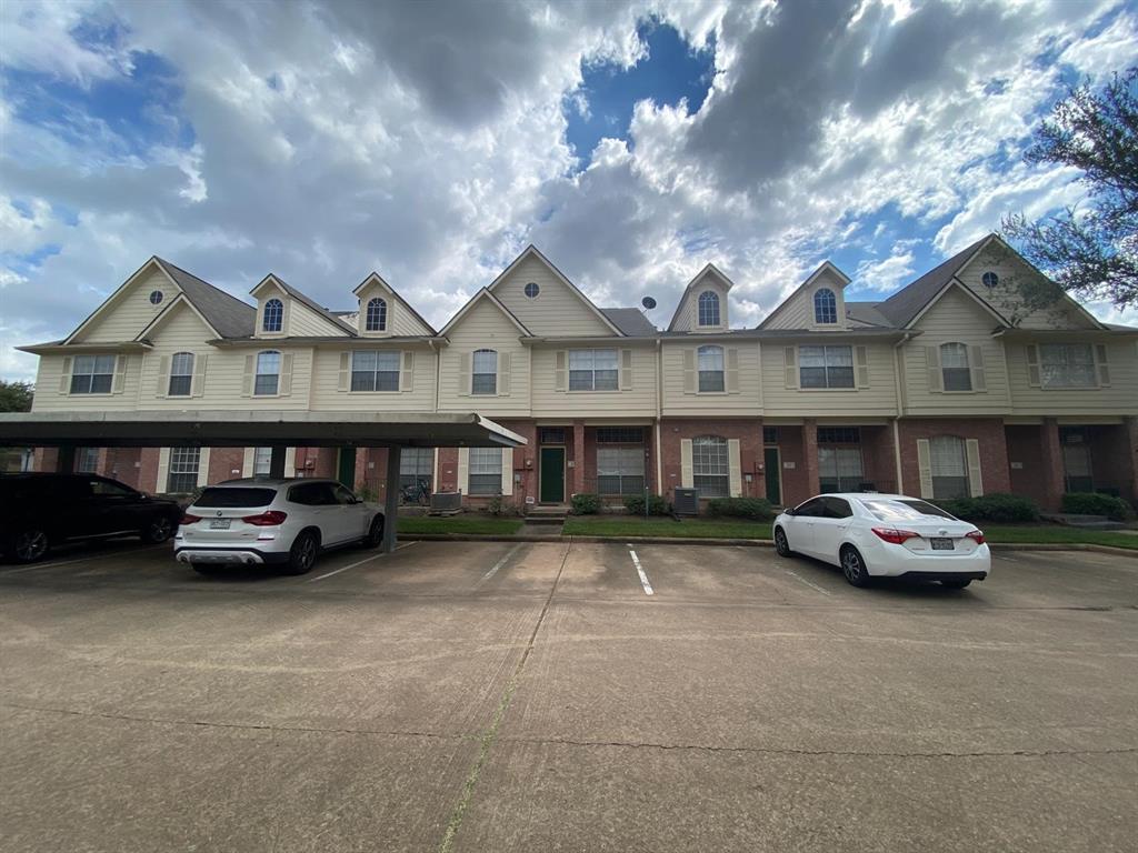 a car parked in front of a house