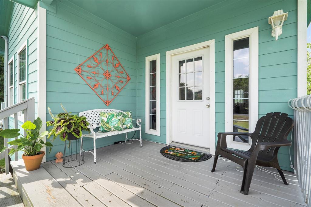 a outdoor living space with furniture and a potted plant