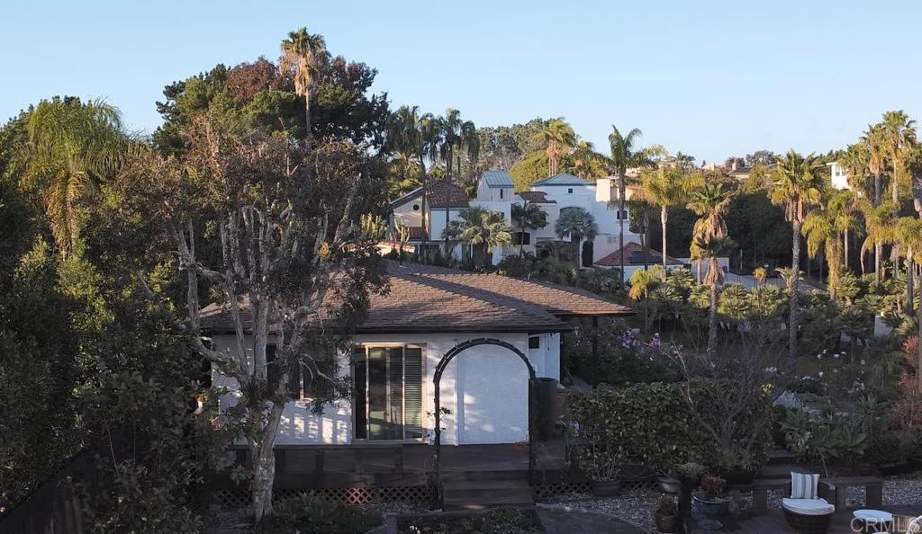 a house view with a garden