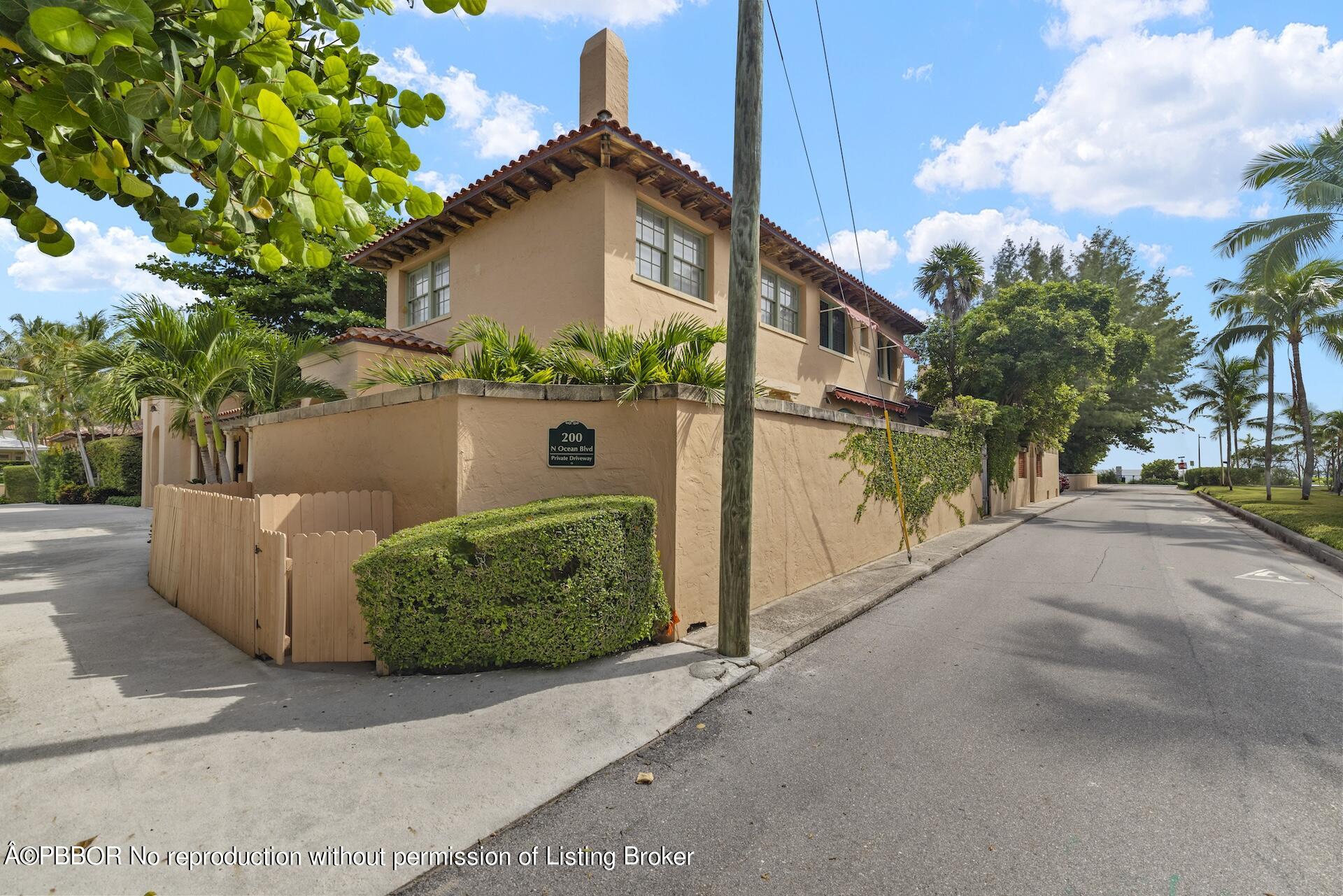 a view of a house with a street