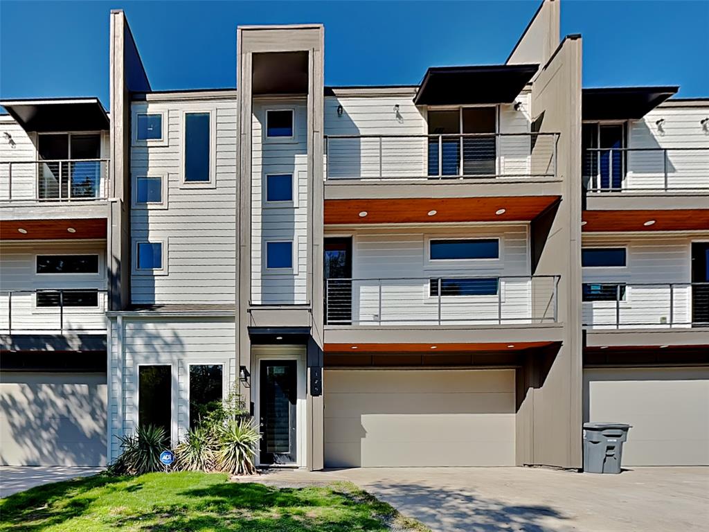 a front view of a multi story residential apartment building