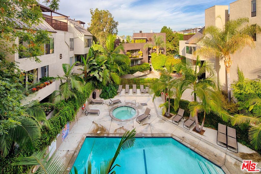 a view of yard with swimming pool