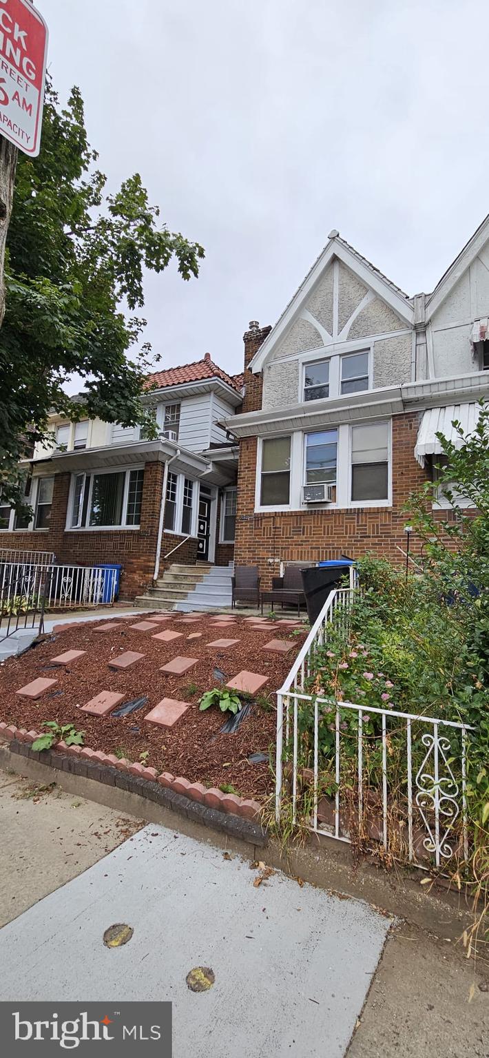 front view of a house with a street