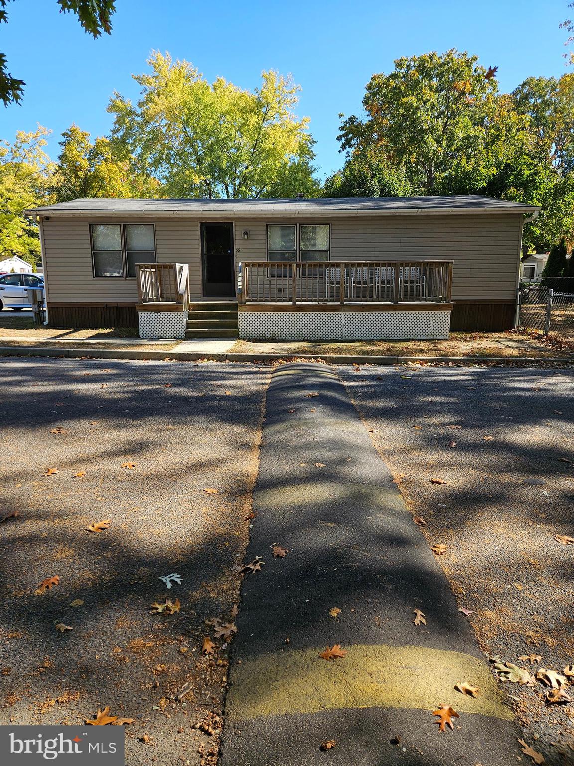 a view of house with yard