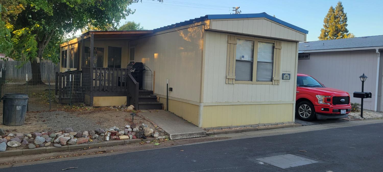 a car parked in front of a house