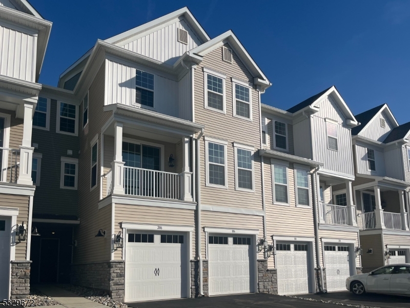 a front view of a large residential apartment building