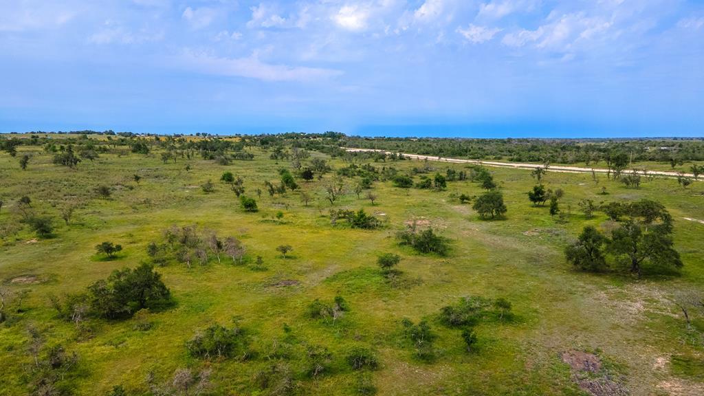 a view of lake with green space