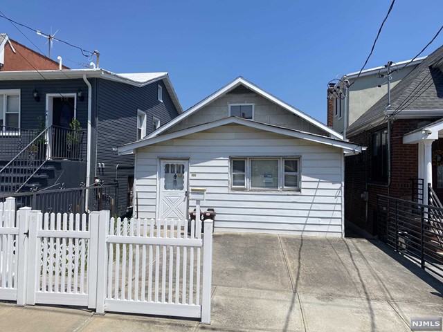 a front view of a house with a porch