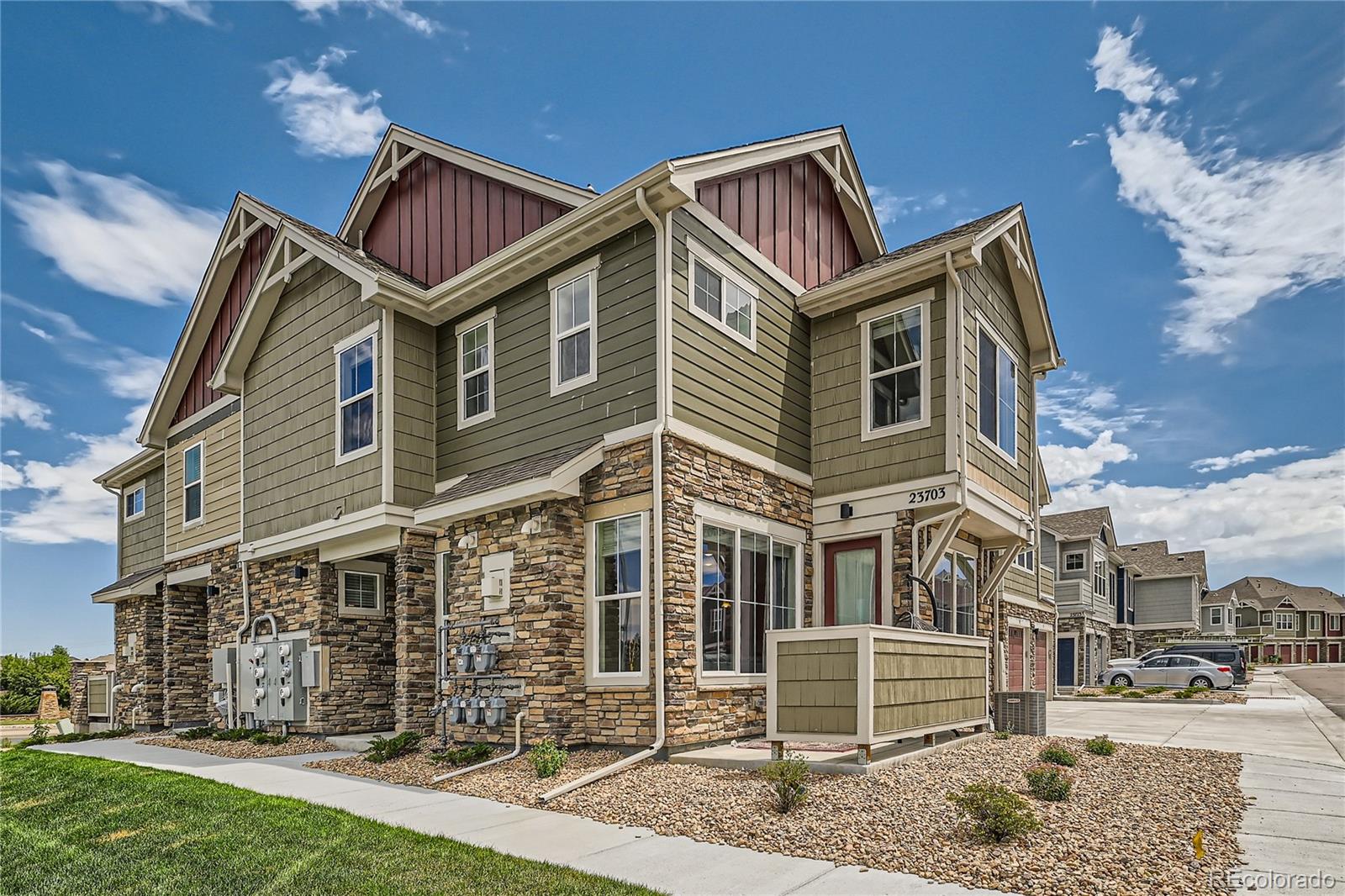 front view of a house with a yard