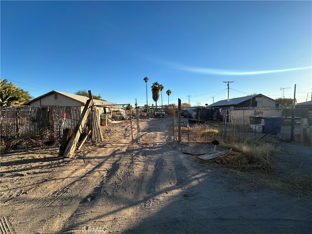 a view of a street in front of a house