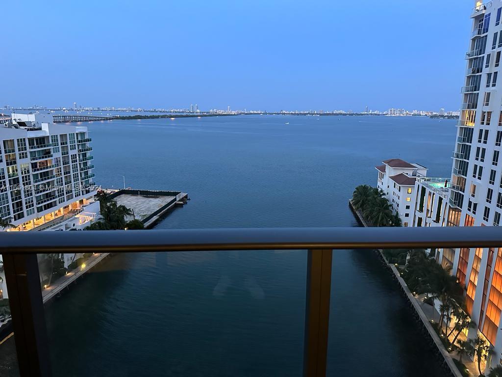 a view of a balcony with an ocean view