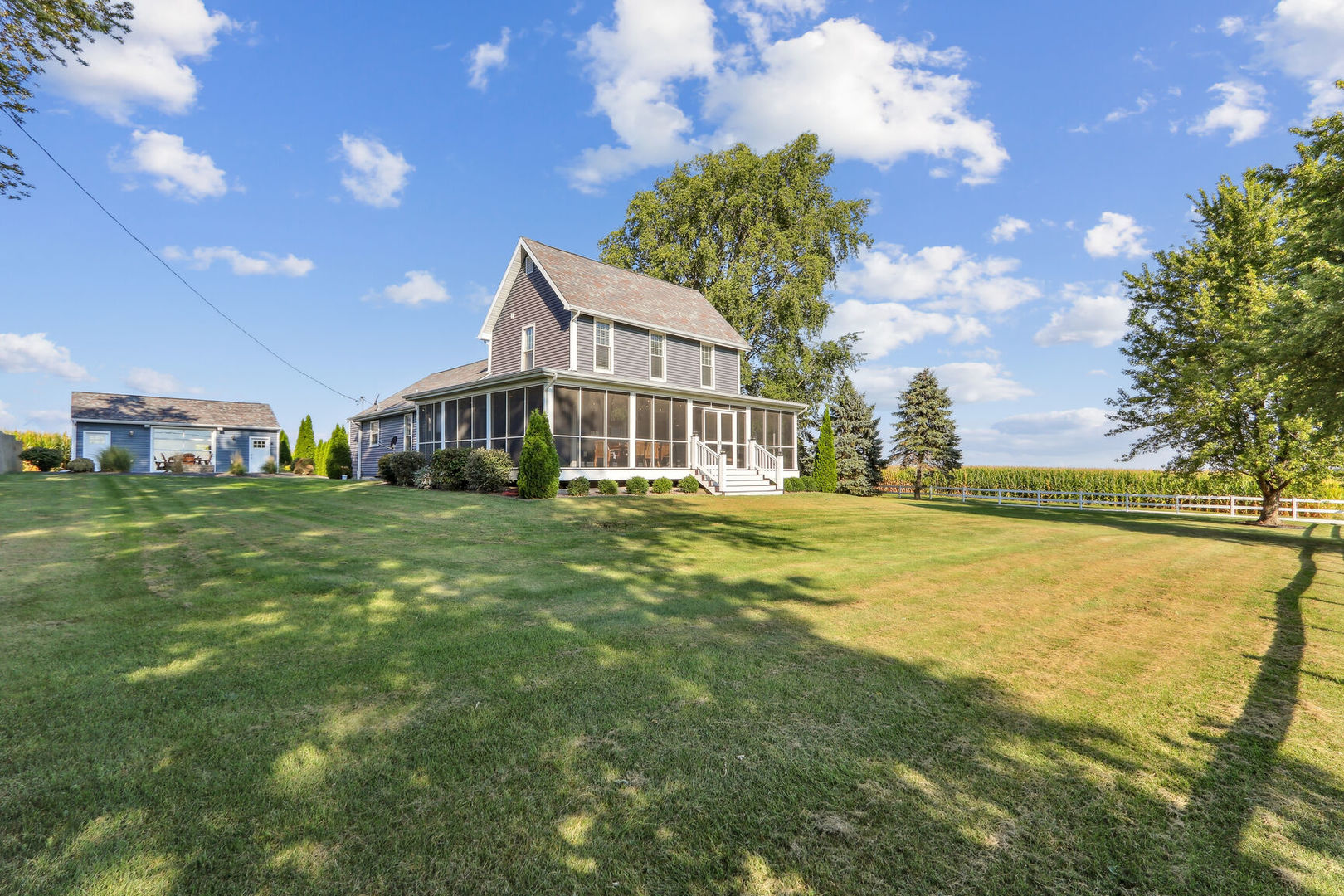 a view of a house with a big yard