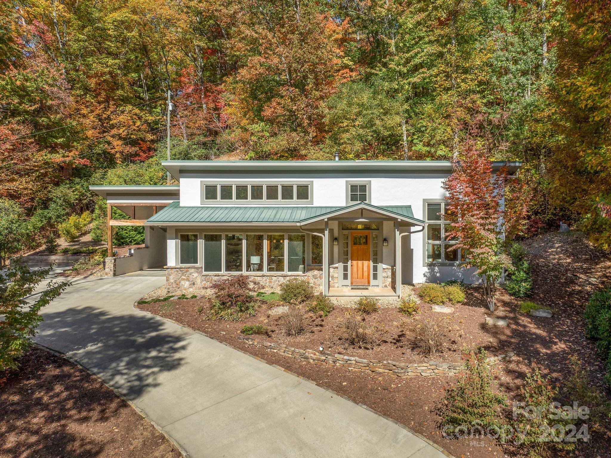 front view of a house with a yard