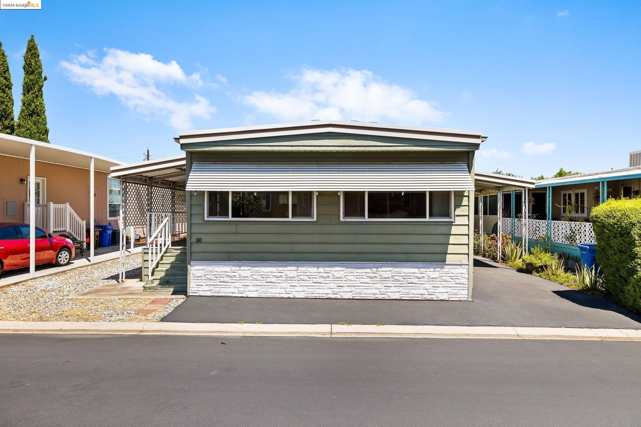 a house view with a outdoor space