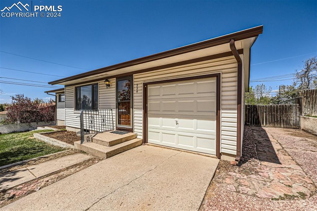 Single story home with a garage