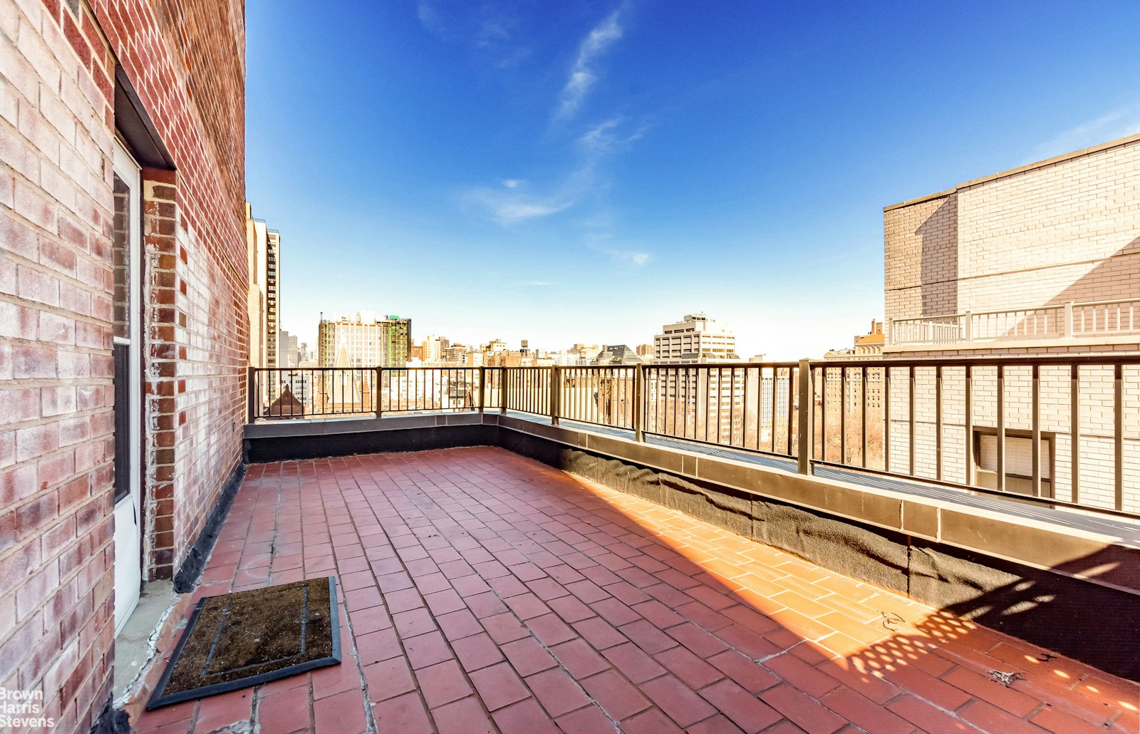 a view of terrace with wooden floor