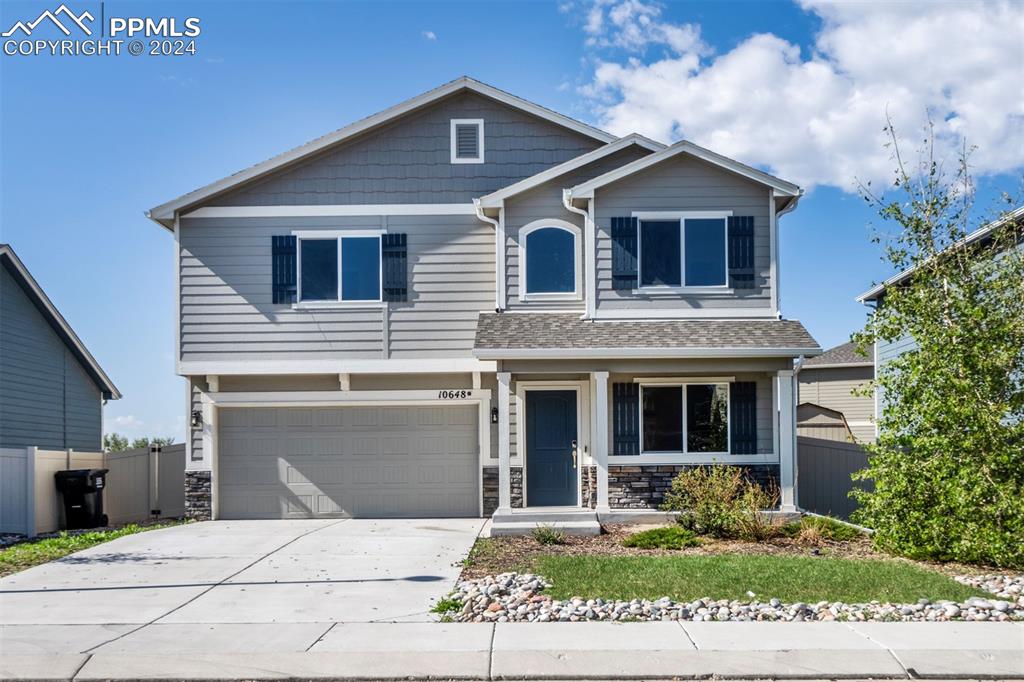 View of front of home with a garage