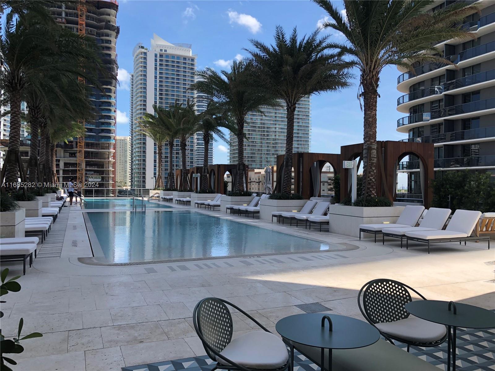 a view of a patio with swimming pool