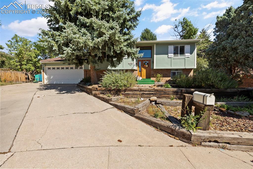 a house with trees in front of it