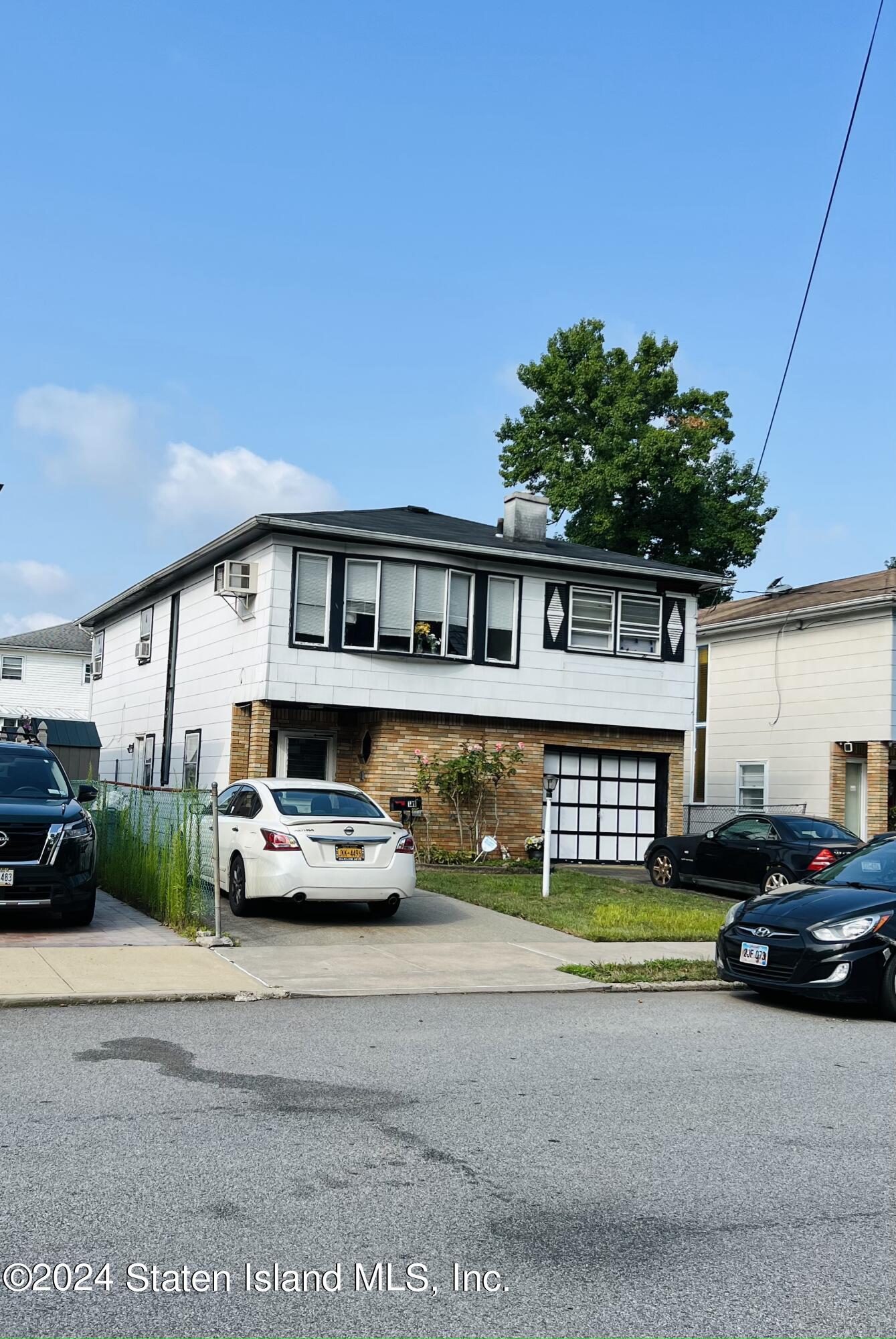 a car parked in front of a house