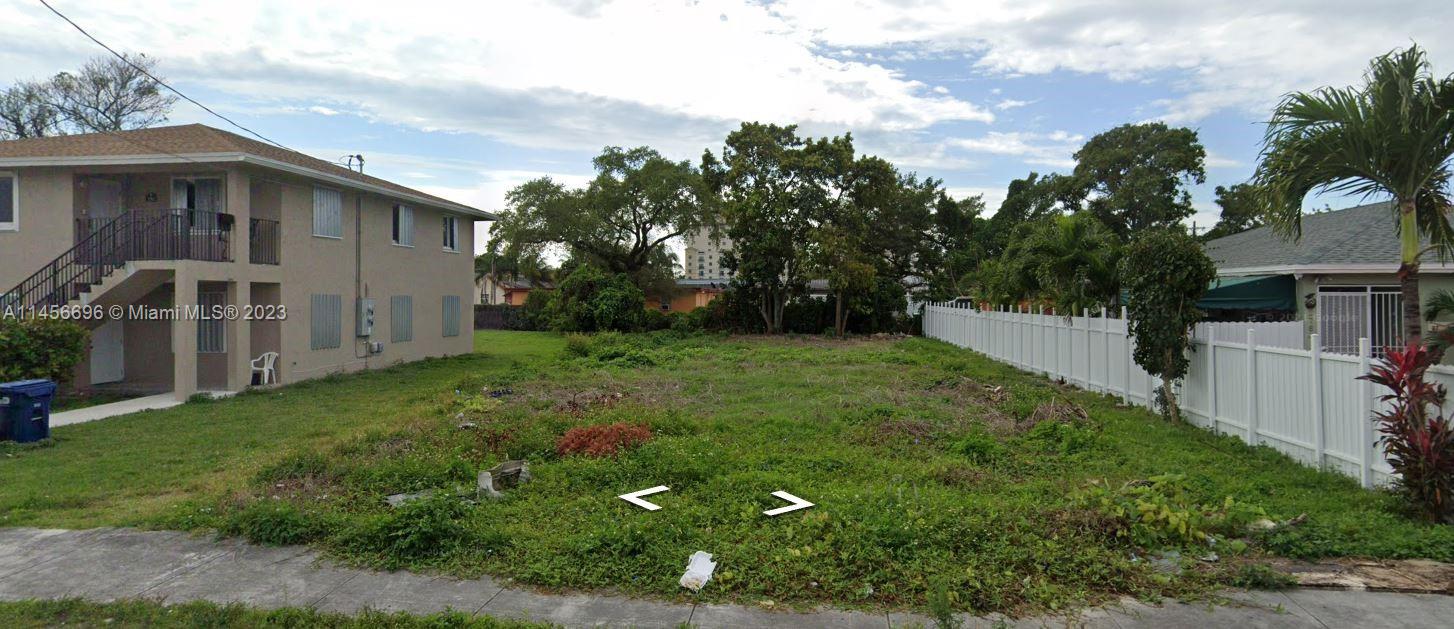 a view of a backyard with a garden