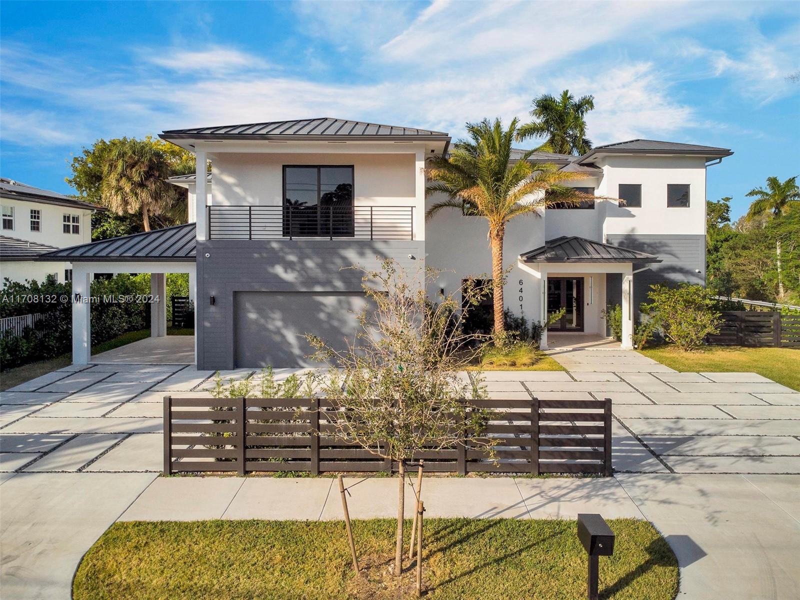 a front view of a house with entertaining space