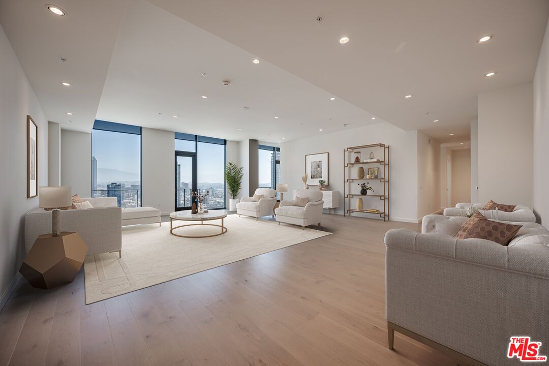 a living room with furniture and a table