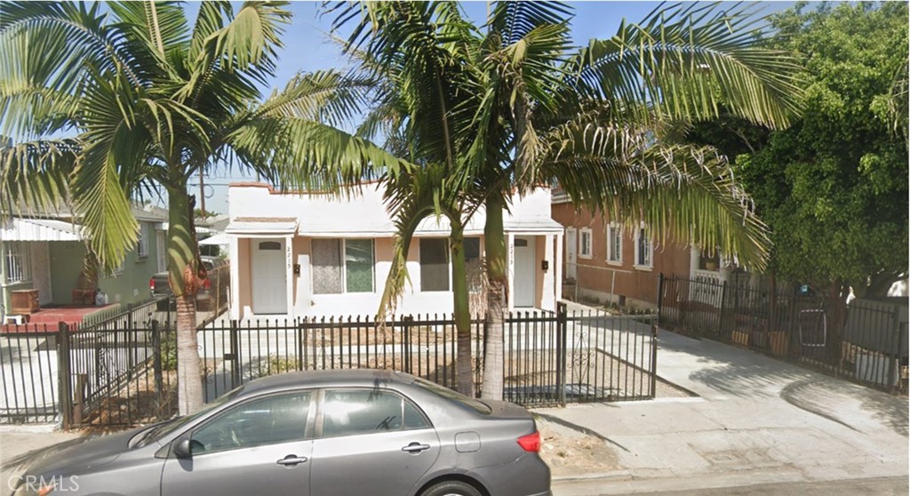 a front view of a house with swimming pool