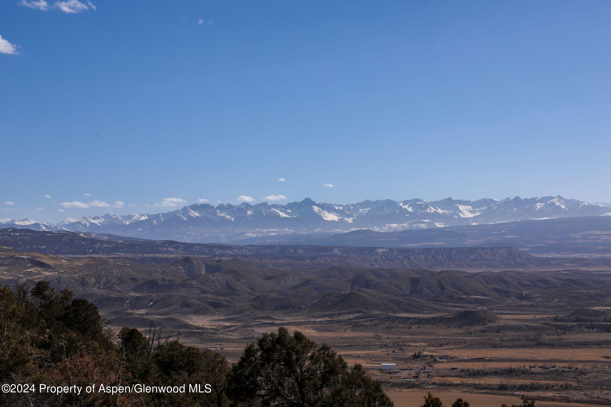 a view of mountain view with mountains in the background