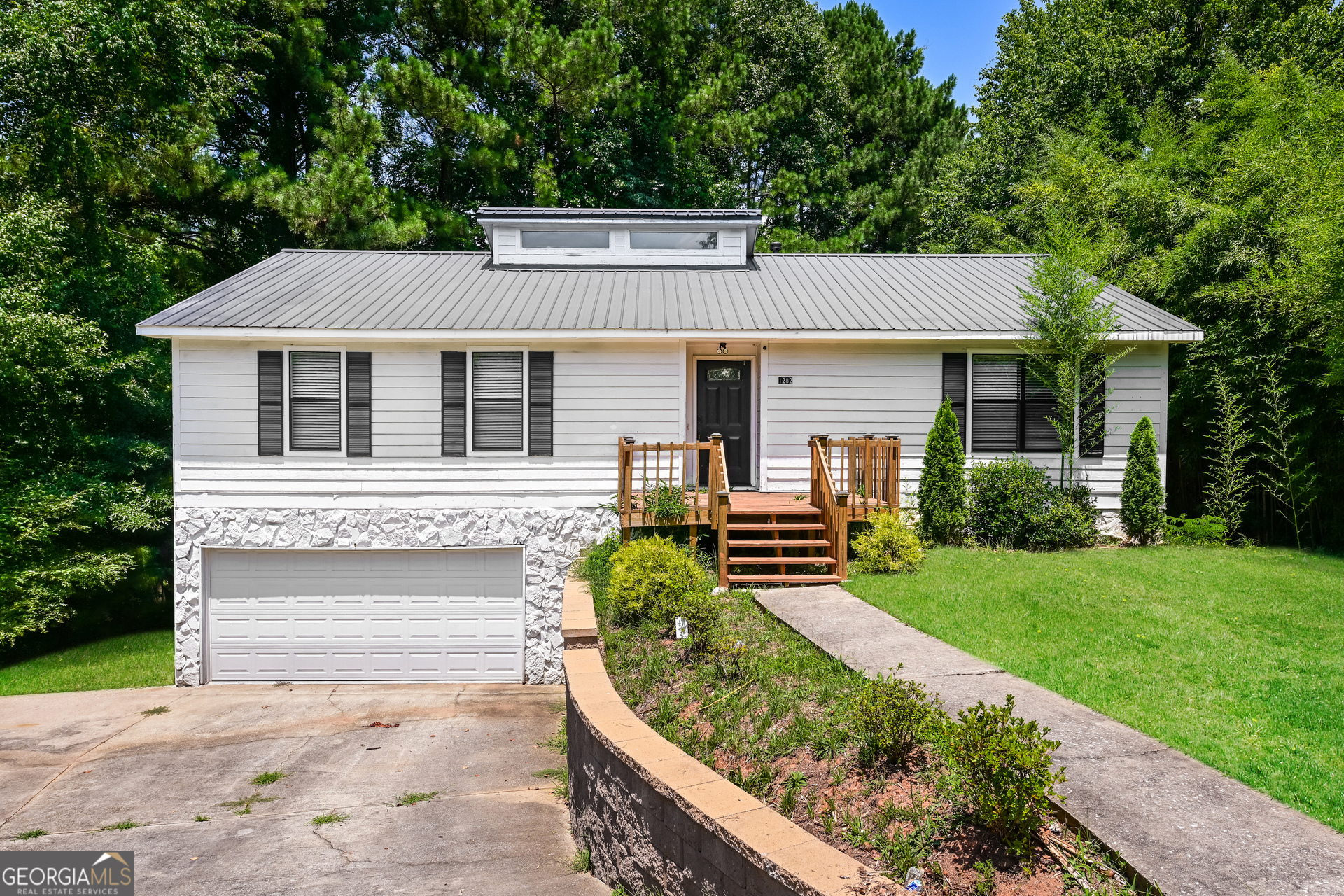 front view of a house with yard